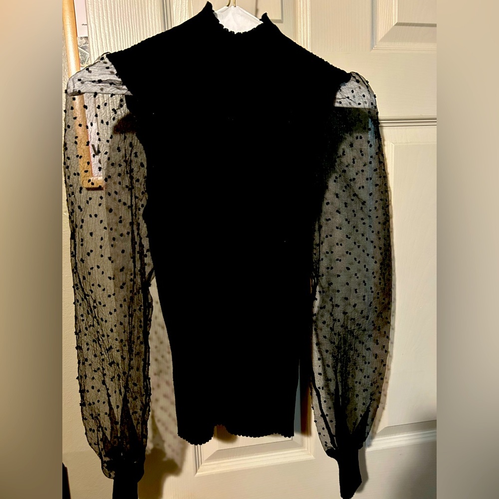 Black sweater with lace bell sleeves